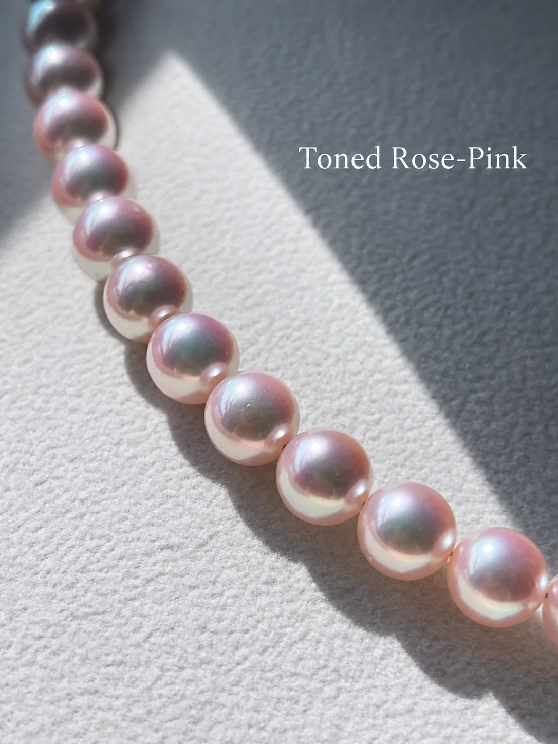A rose-pink pearl strand