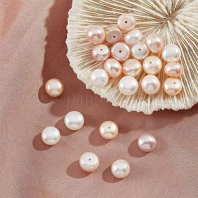 Half-drilled white pearls with visible holes, distinct from a half-round pearl shape