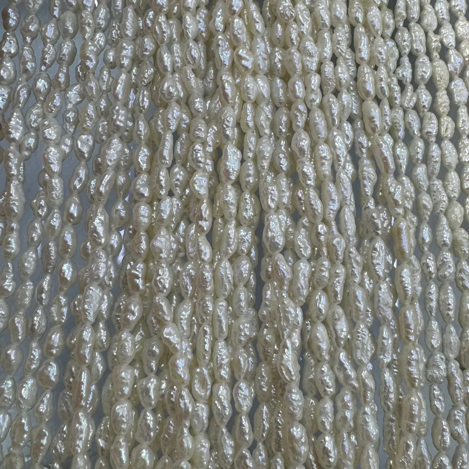 white baroque pearl strands