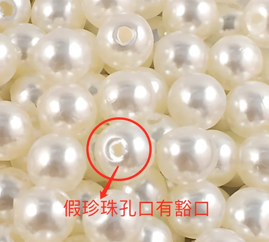 Comparison of imitation pearl and real pearl drill holes under magnification