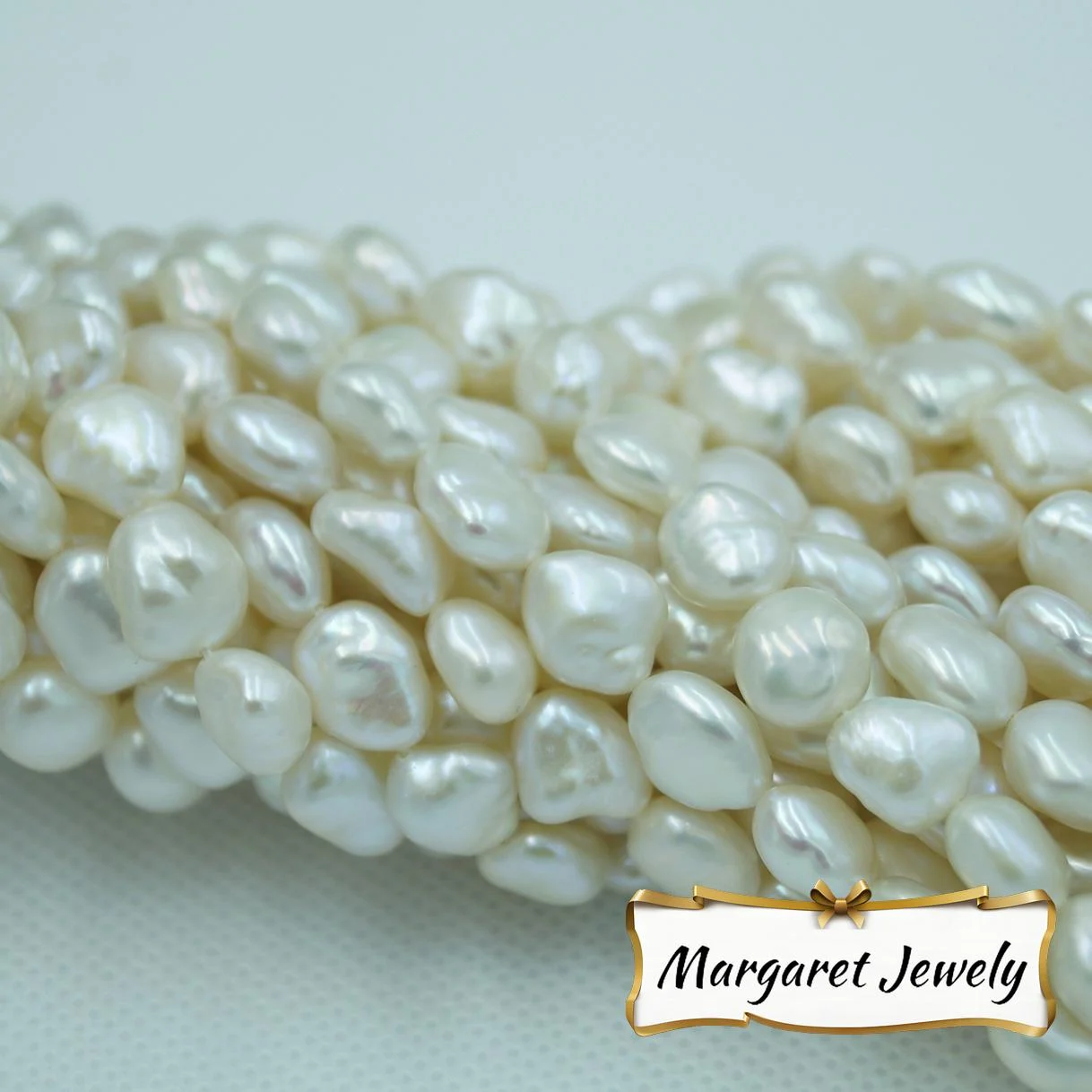 Iridescent White Lightly Blemished Two-Side Luster Freshwater Pearl Strand