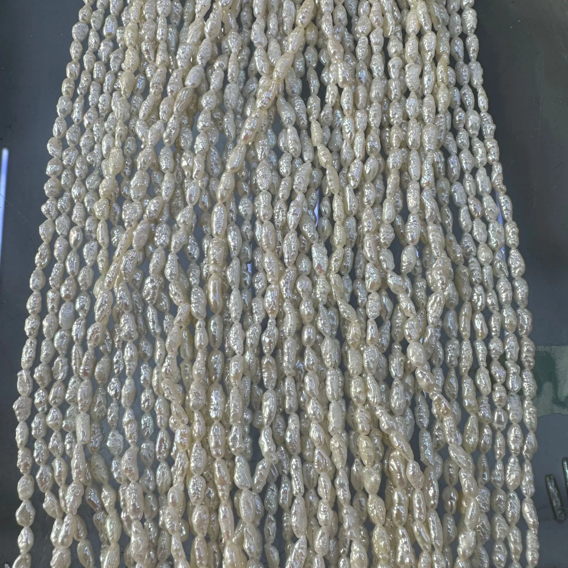 3-4 mm Wrinkled Rice-Shaped Freshwater Keshi Pearl Strand