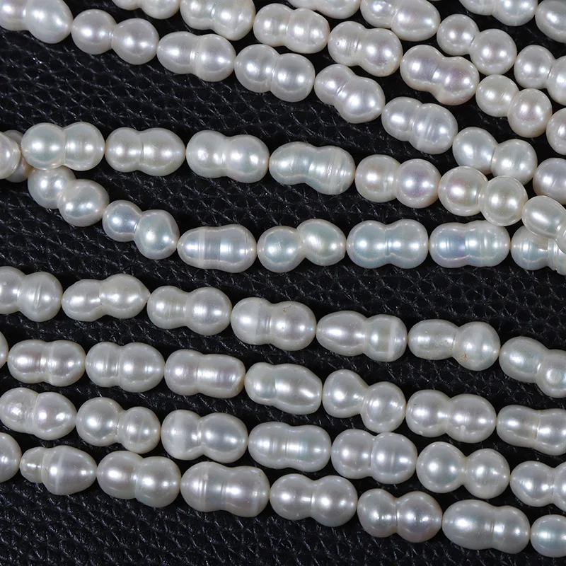 High-Luster Minimal-Blemish Gourd-Shaped Figure-8 Freshwater Baroque Pearl Strand