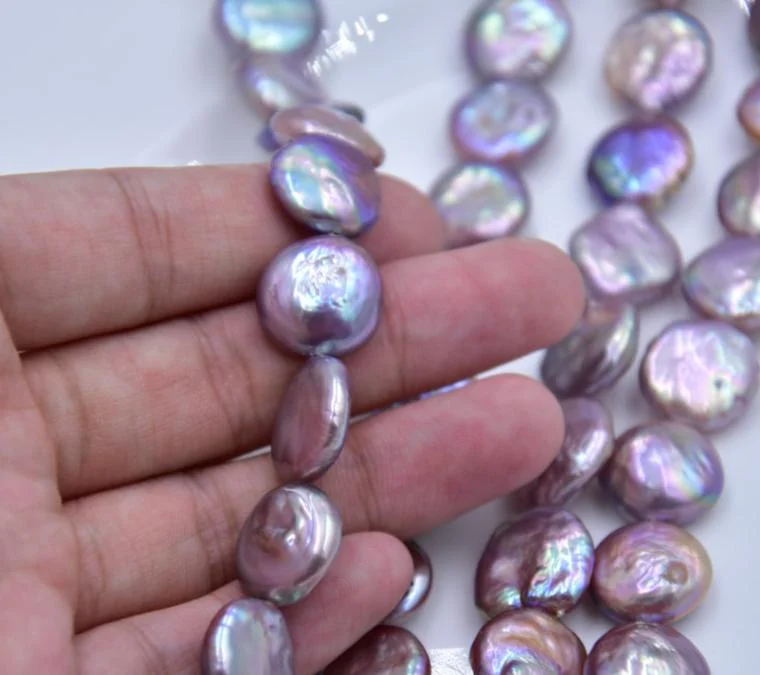 Iridescent High-Luster Lightly Blemished Button-Shaped Freshwater Baroque Pearl Strand
