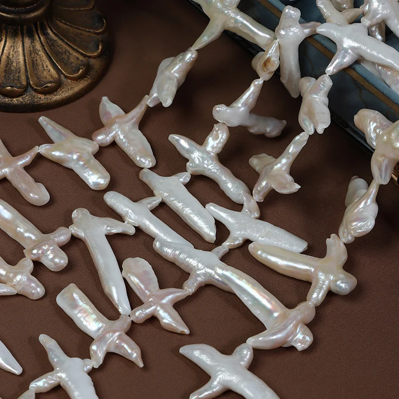 Lightly Blemished Cross-Shaped Horizontal-Drilled Freshwater Baroque Pearl Strand