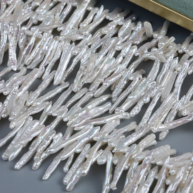 High-Luster Lightly Blemished Thread-Textured Offset-Drilled Toothpick-Shaped Freshwater Baroque Pearl Strand
