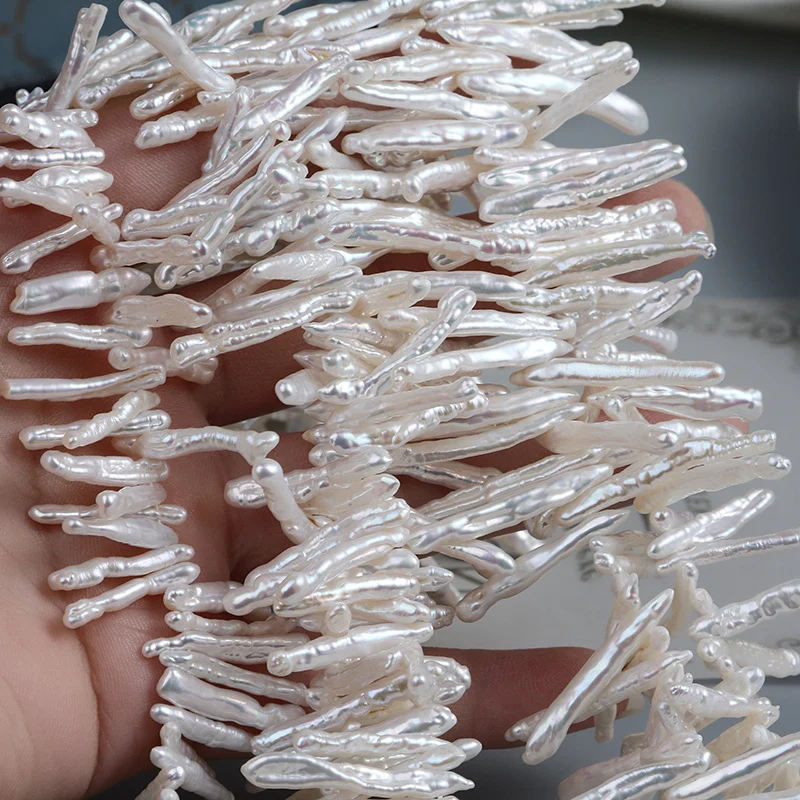 High-Luster Lightly Blemished Thread-Textured Offset-Drilled Toothpick-Shaped Freshwater Baroque Pearl Strand