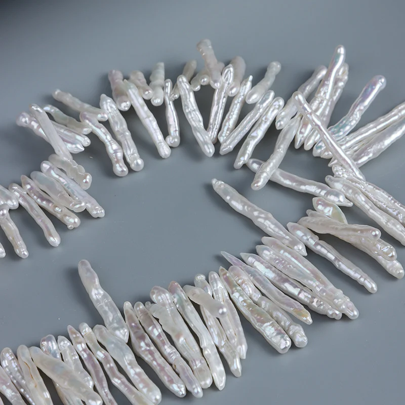 High-Luster Lightly Blemished Thread-Textured Offset-Drilled Toothpick-Shaped Freshwater Baroque Pearl Strand