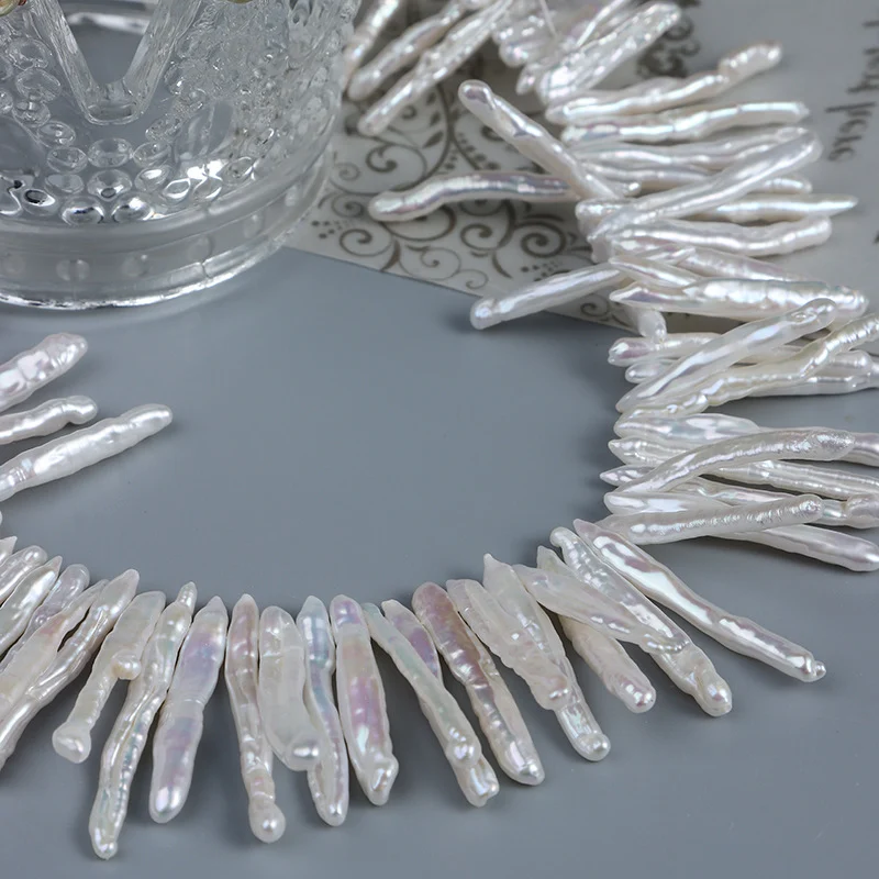 High-Luster Lightly Blemished Thread-Textured Offset-Drilled Toothpick-Shaped Freshwater Baroque Pearl Strand