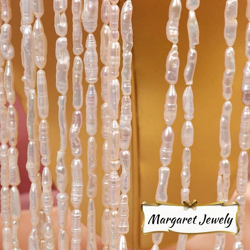 High-Luster Thread-Textured Toothpick-Shaped Freshwater Baroque Pearl Strand