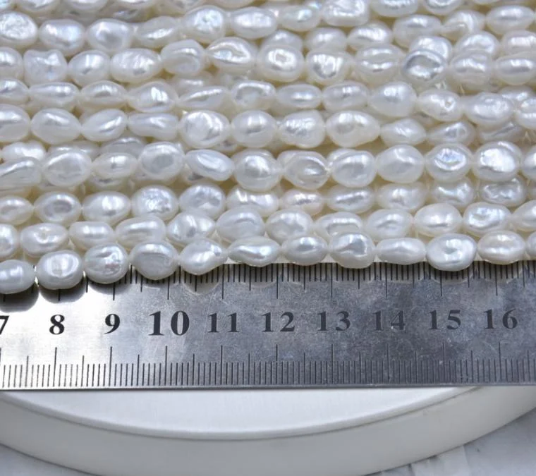 Cream White Lightly Blemished Organic Freshwater Keshi Baroque Pearl Strand