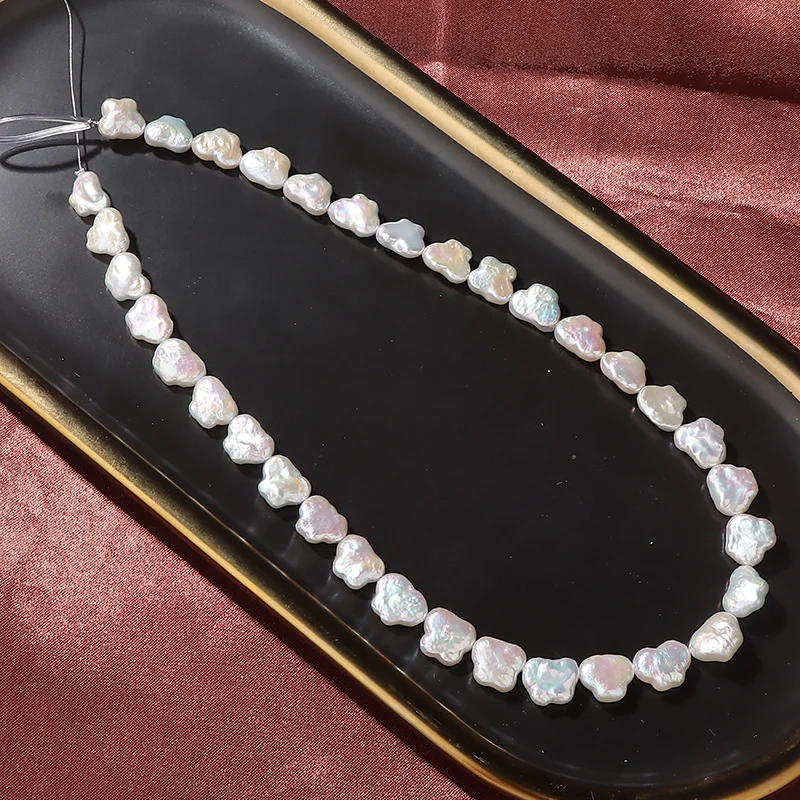 Iridescent High-Luster Lightly Blemished Butterfly-Shaped Horizontal-Drilled Freshwater Baroque Pearl Strand