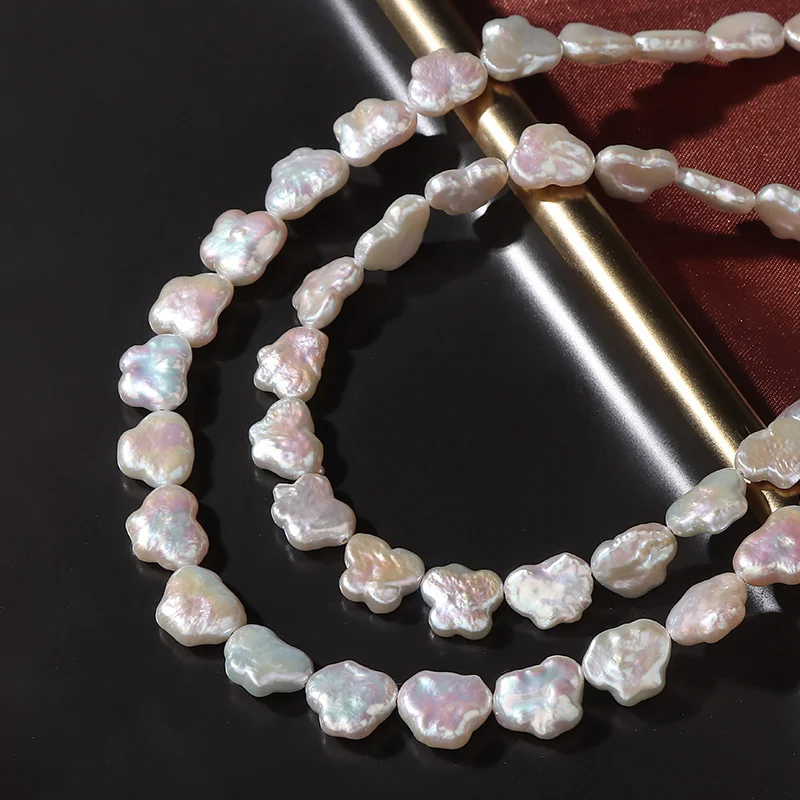 Iridescent High-Luster Lightly Blemished Butterfly-Shaped Horizontal-Drilled Freshwater Baroque Pearl Strand