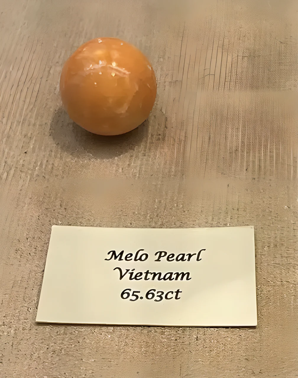 A fine Melo pearl is valued for its color, porcelain-like luster, and visible flame structure.