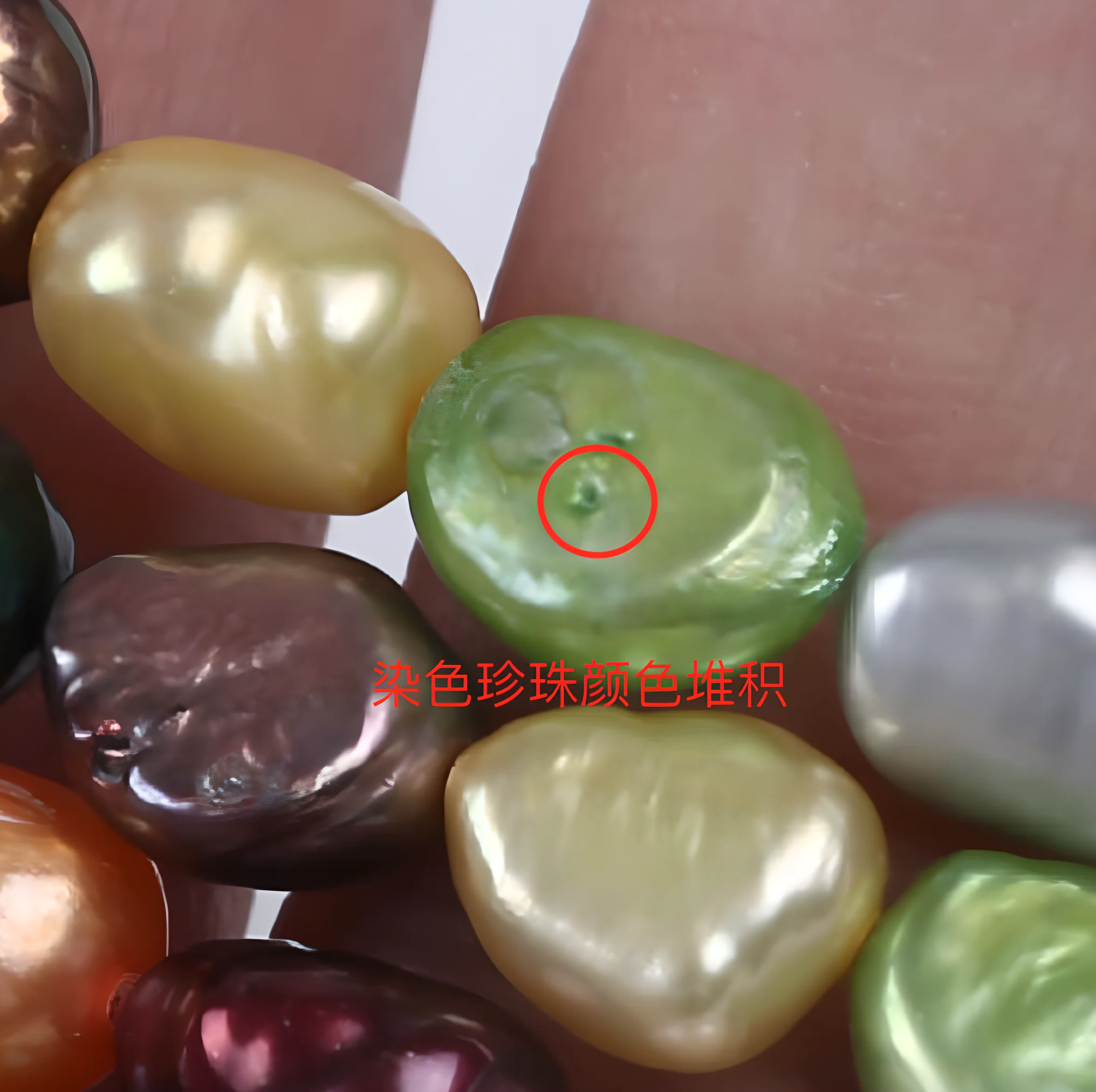 Dyed pearl showing concentrated color near imperfections