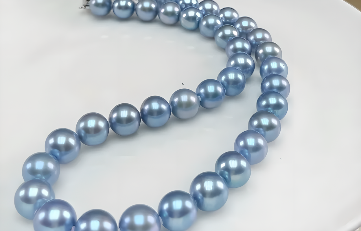 cultured pearls in different colors showing natural and treated appearance differences