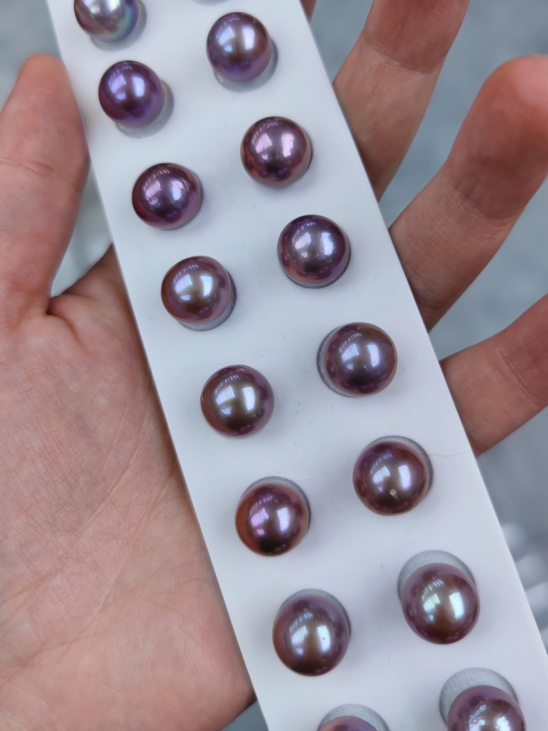 three finished jewelry examples at different quality tiers