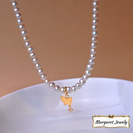 Akoya Baby Pearl Strand Necklace with Bowknot Pendant and Universal Clasp, 18K Gold